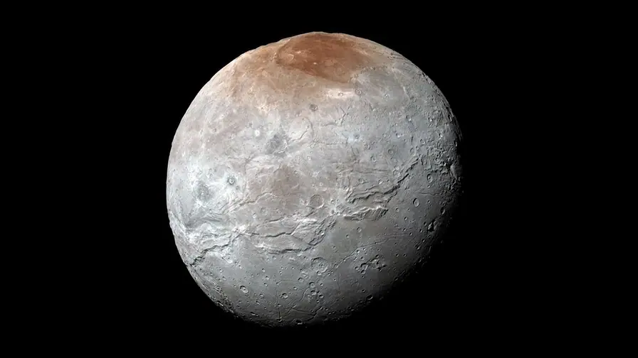 Pluto's Moon Charon: Strange Mountains Formed by Slowing Rotation