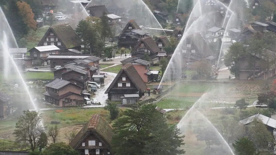 Curtains of Water Shield Shirakawa-go's Historic Thatched Roofs